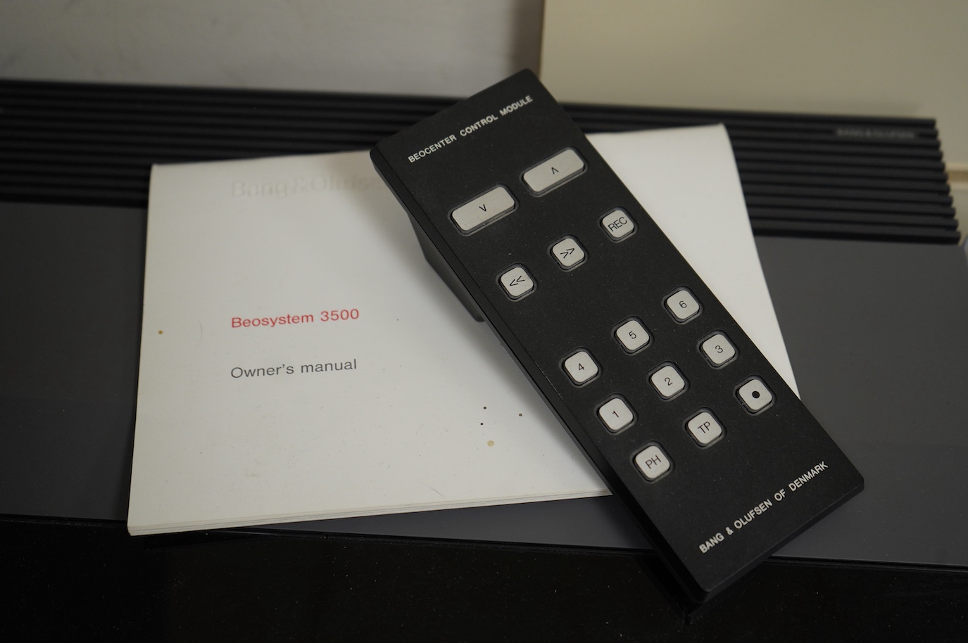 A 1980s Bang & Olufsen Beosystem 3500 stereo system, comprising; a Beocord 3500, a Beogram CD 3500, a Beomaster 3500, a pair of Beovox C75 stereo speakers, a Beocenter Control Module and an Owner’s Manual dated 1989.